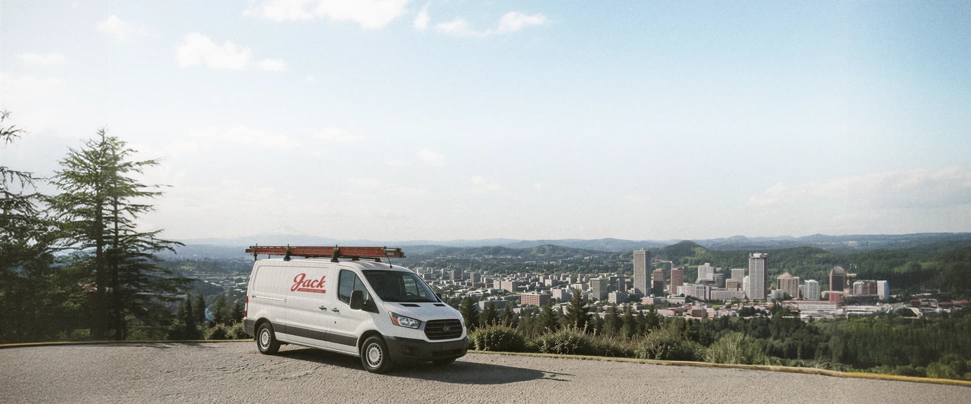 Jack's service van parked above downtown Portland